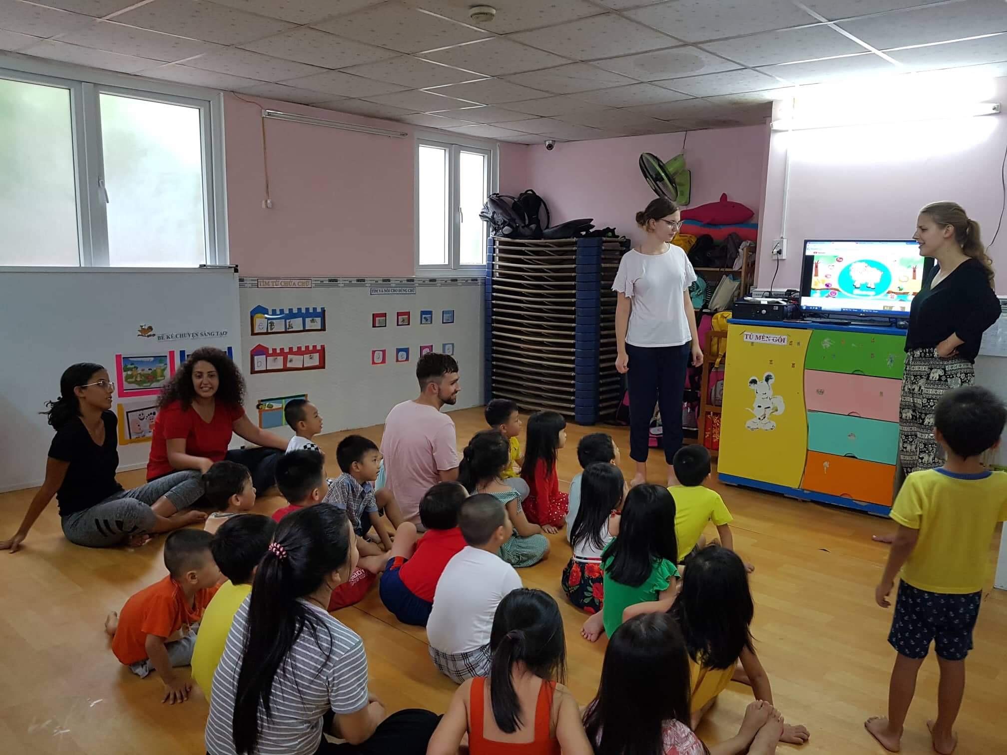 Participants teaching English to kids.JPG