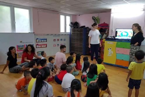 Participants teaching English to kids.webp